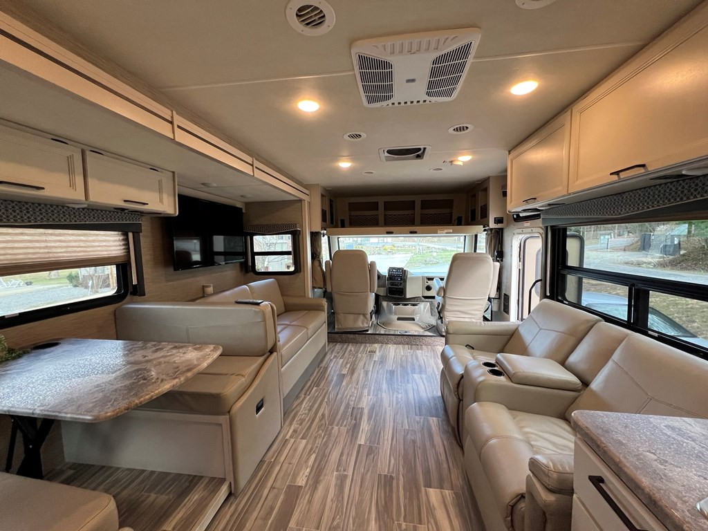 62 Waterside Blue Ridge Morganton, GA 30560 - Photo 32 of 38 a living room with furniture and a flat screen tv