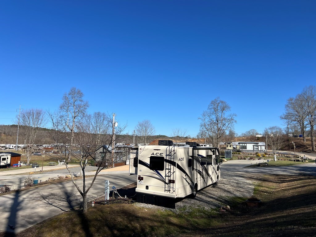 62 Waterside Blue Ridge Morganton, GA 30560 - Photo 5 of 38 a view of a terrace with wooden floor