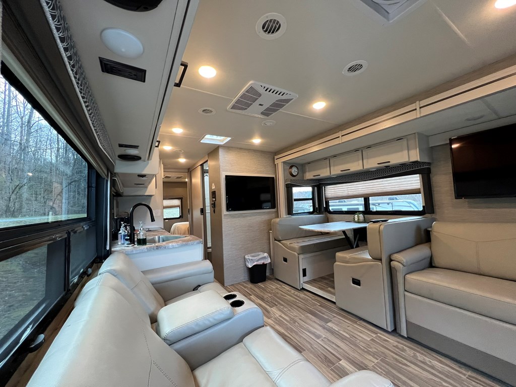 62 Waterside Blue Ridge Morganton, GA 30560 - Photo 6 of 38 a living room with furniture and a flat screen tv