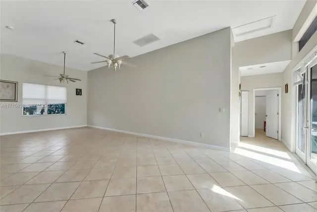 $1,120,000 | 4956 Rothschild Drive, Coral Springs, FL 33067