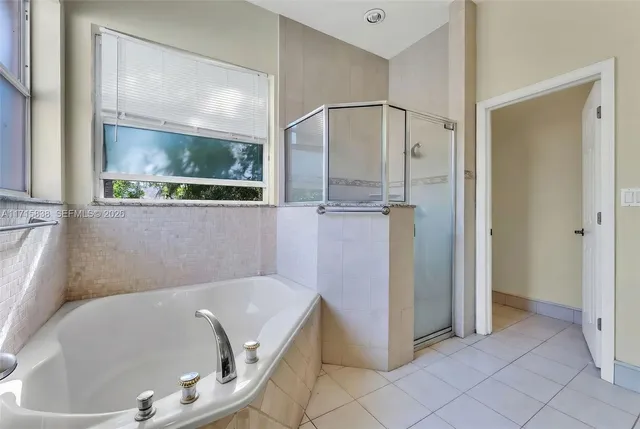 $1,120,000 | 4956 Rothschild Drive, Coral Springs, FL 33067