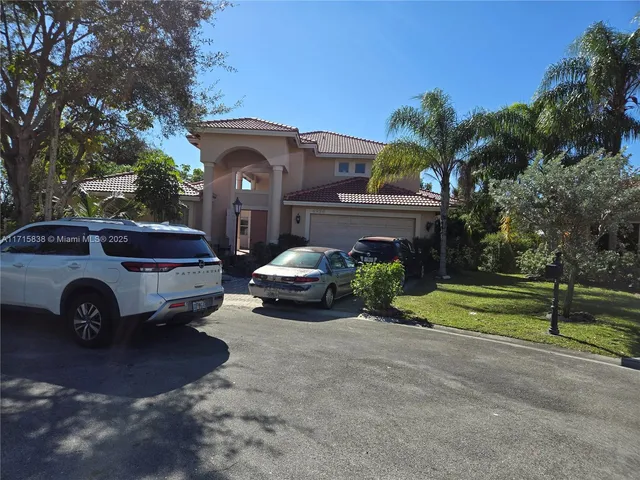 $1,130,000 | 4956 Rothschild Drive, Coral Springs, FL 33067