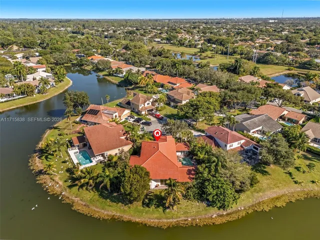$1,120,000 | 4956 Rothschild Drive, Coral Springs, FL 33067