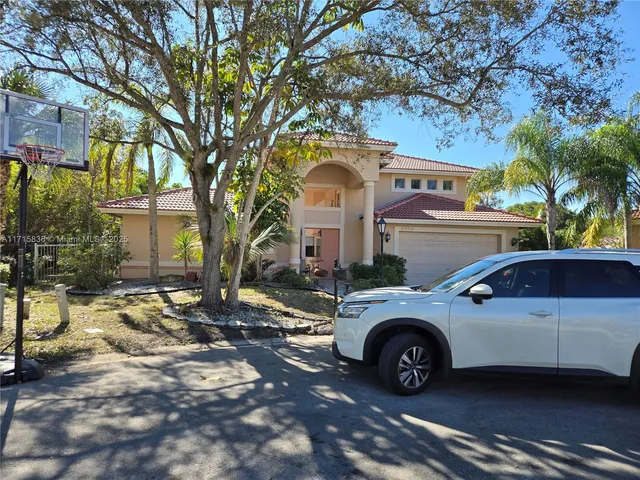 $1,130,000 | 4956 Rothschild Drive, Coral Springs, FL 33067