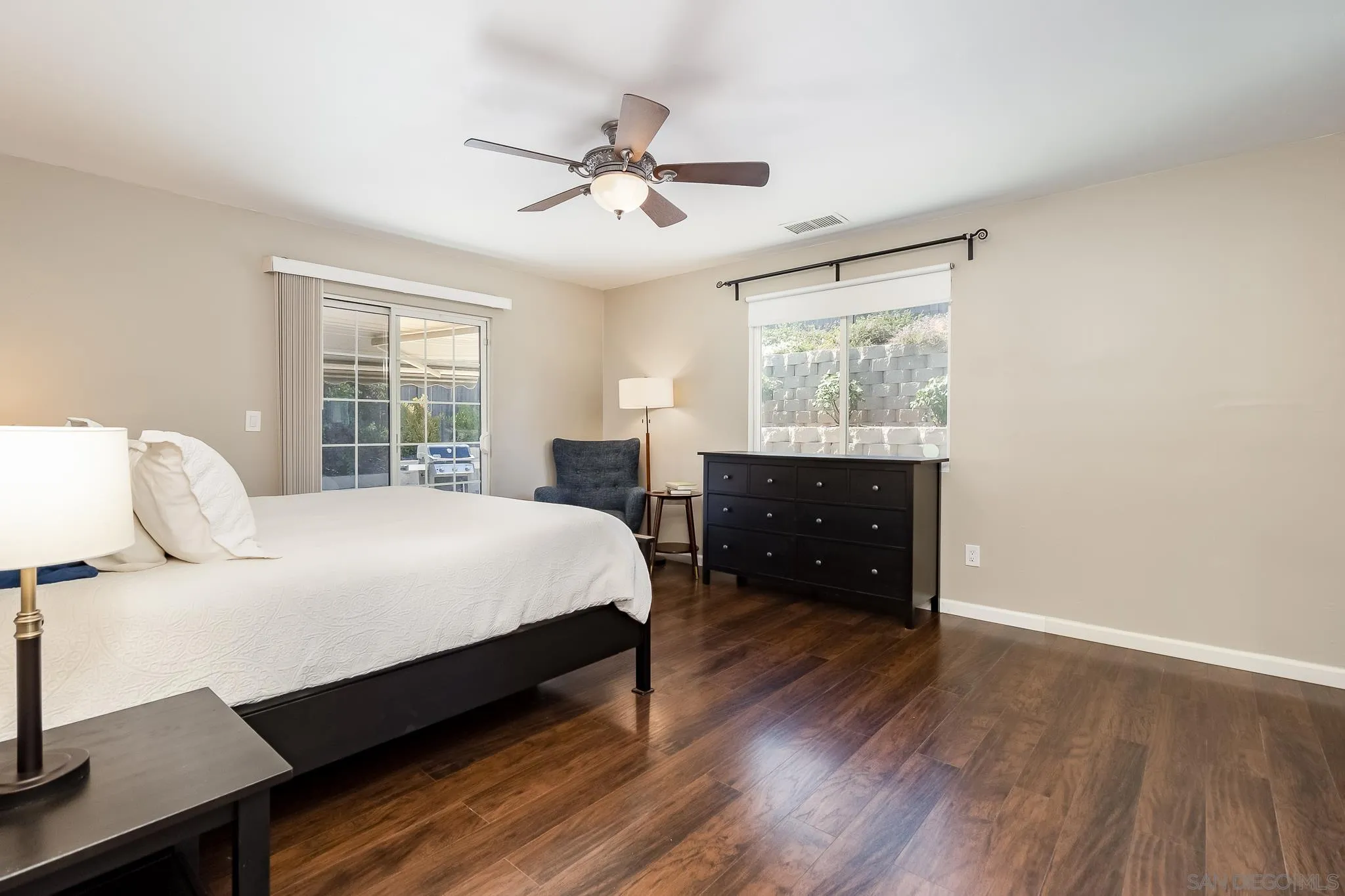 8029 Woodpecker Way Santee, CA 92071 - Photo 15 of 47 a bed room with a bed and window