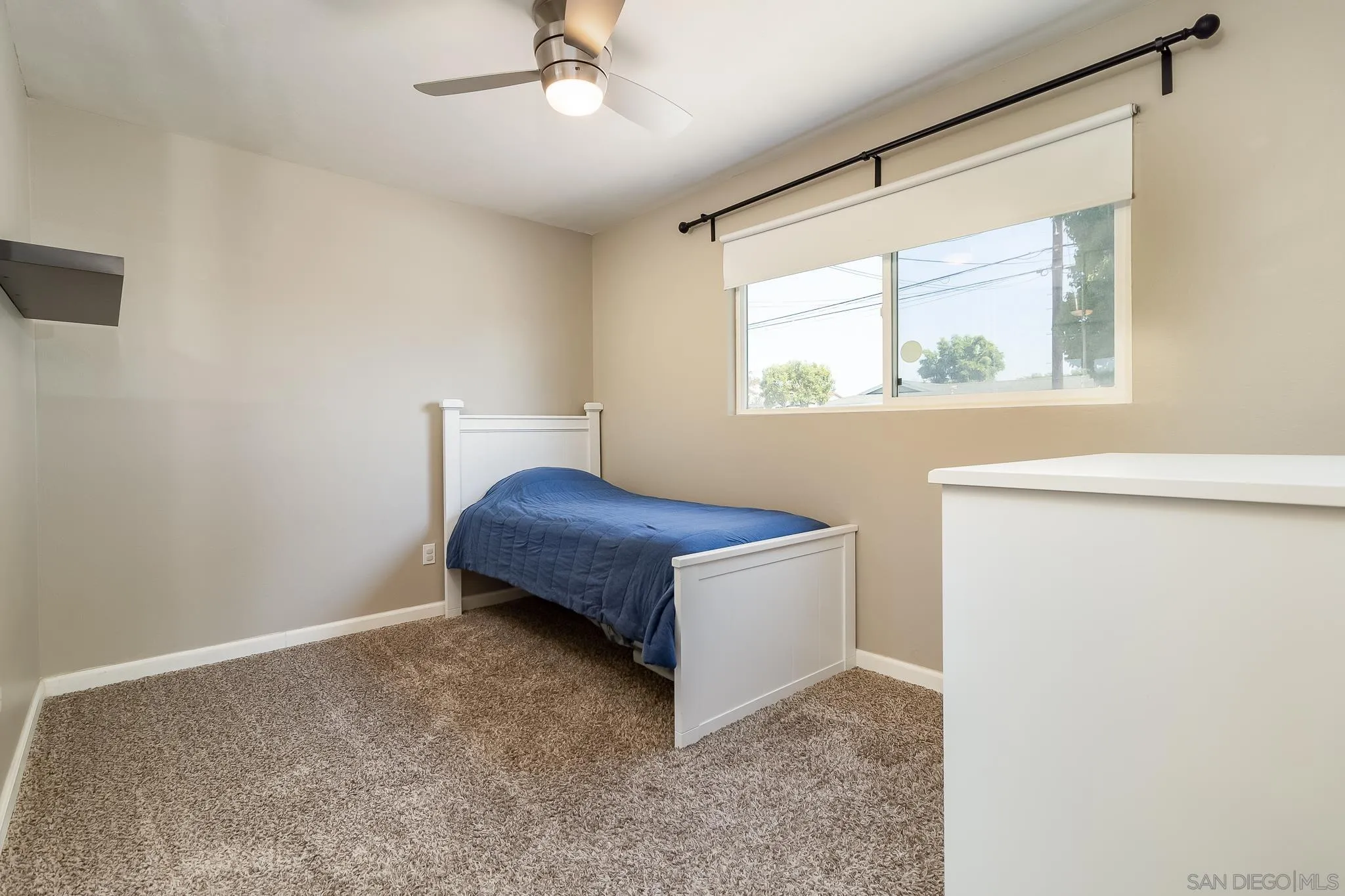 8029 Woodpecker Way Santee, CA 92071 - Photo 20 of 47 a spacious bedroom with a bed and a window