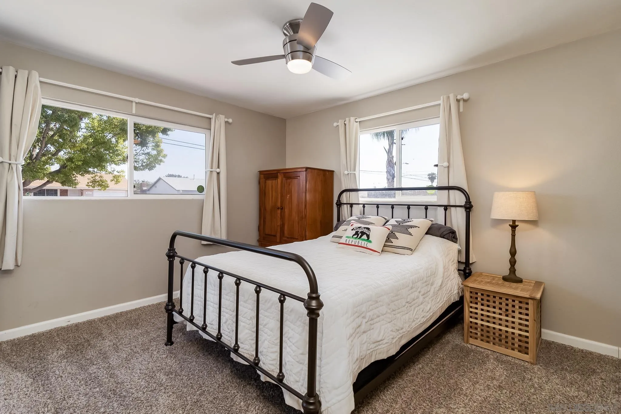 8029 Woodpecker Way Santee, CA 92071 - Photo 22 of 47 a bedroom with a bed and a window