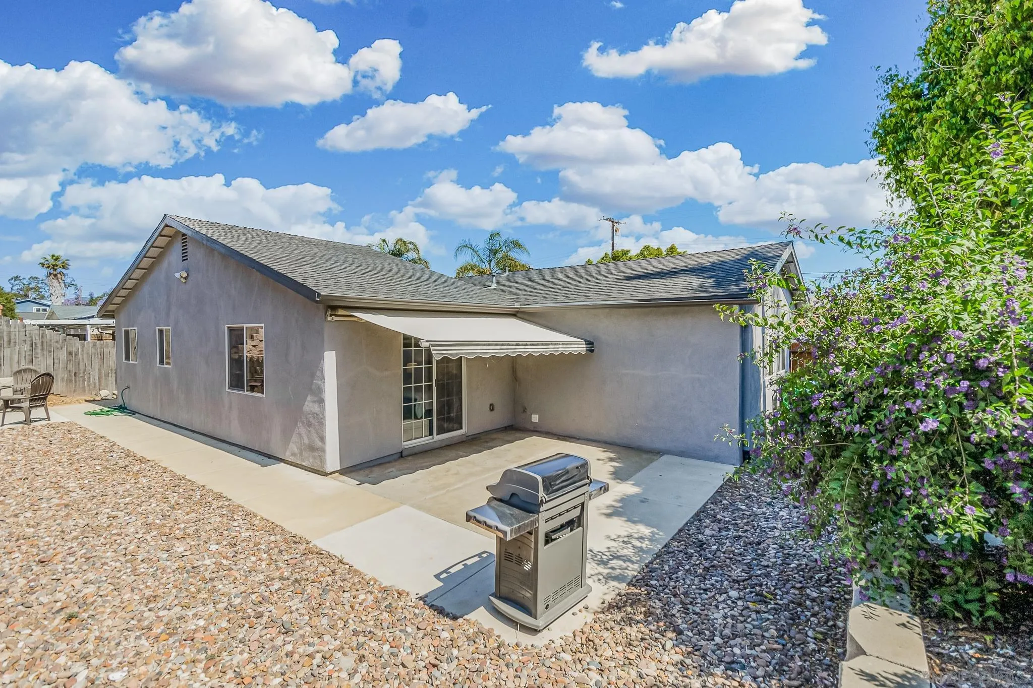 8029 Woodpecker Way Santee, CA 92071 - Photo 27 of 47 a front view of a house with garden