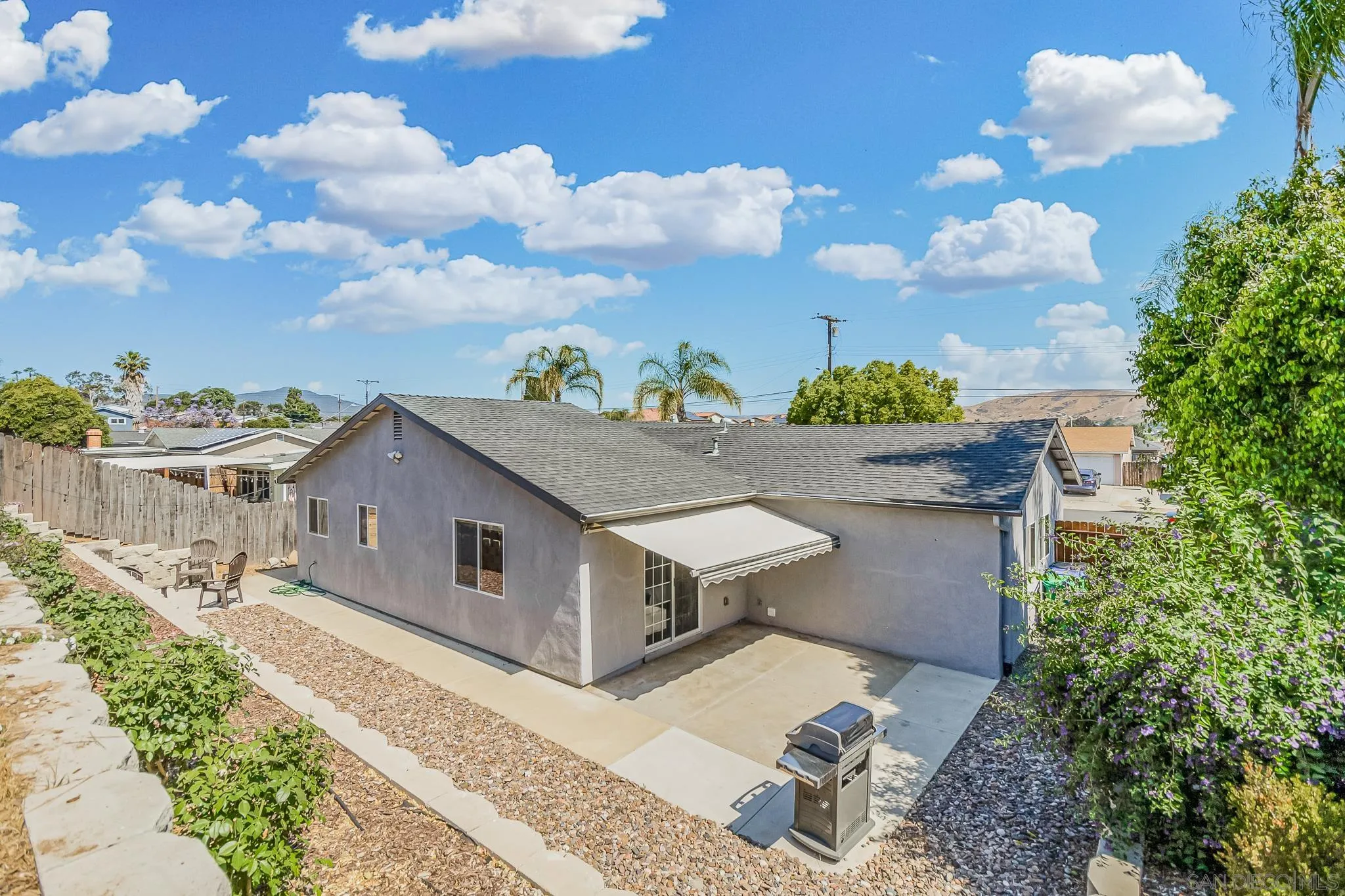 8029 Woodpecker Way Santee, CA 92071 - Photo 28 of 47 a house view with a garden space