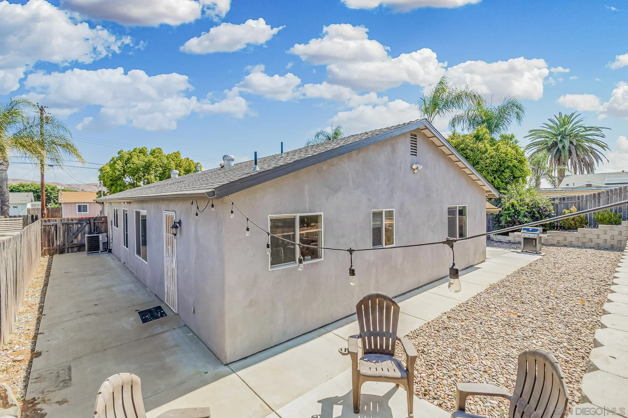 8029 Woodpecker Way Santee, CA 92071 - Photo 30 of 47 a front view of a house with garden