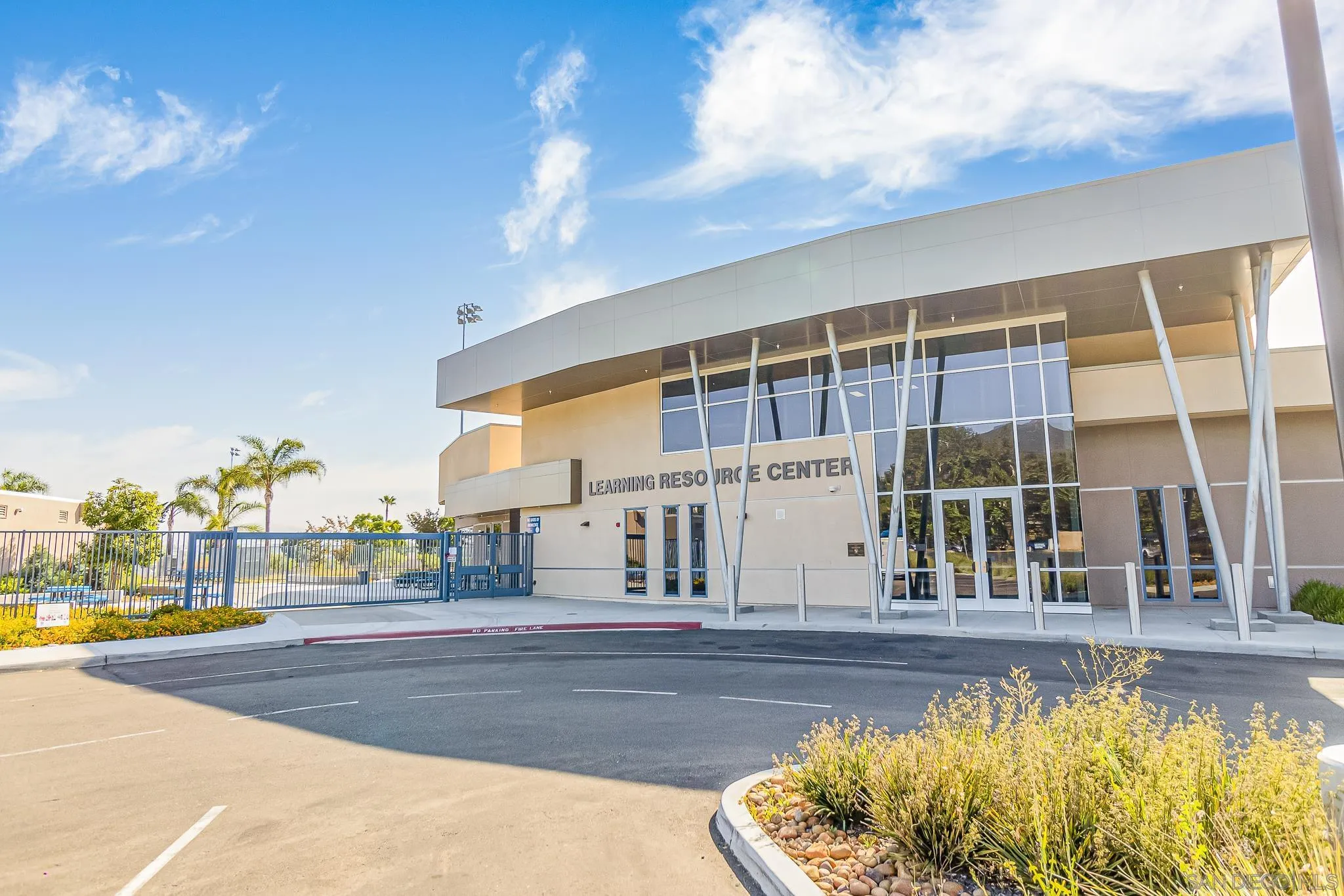 8029 Woodpecker Way Santee, CA 92071 - Photo 38 of 47 a view of a building with a swimming pool