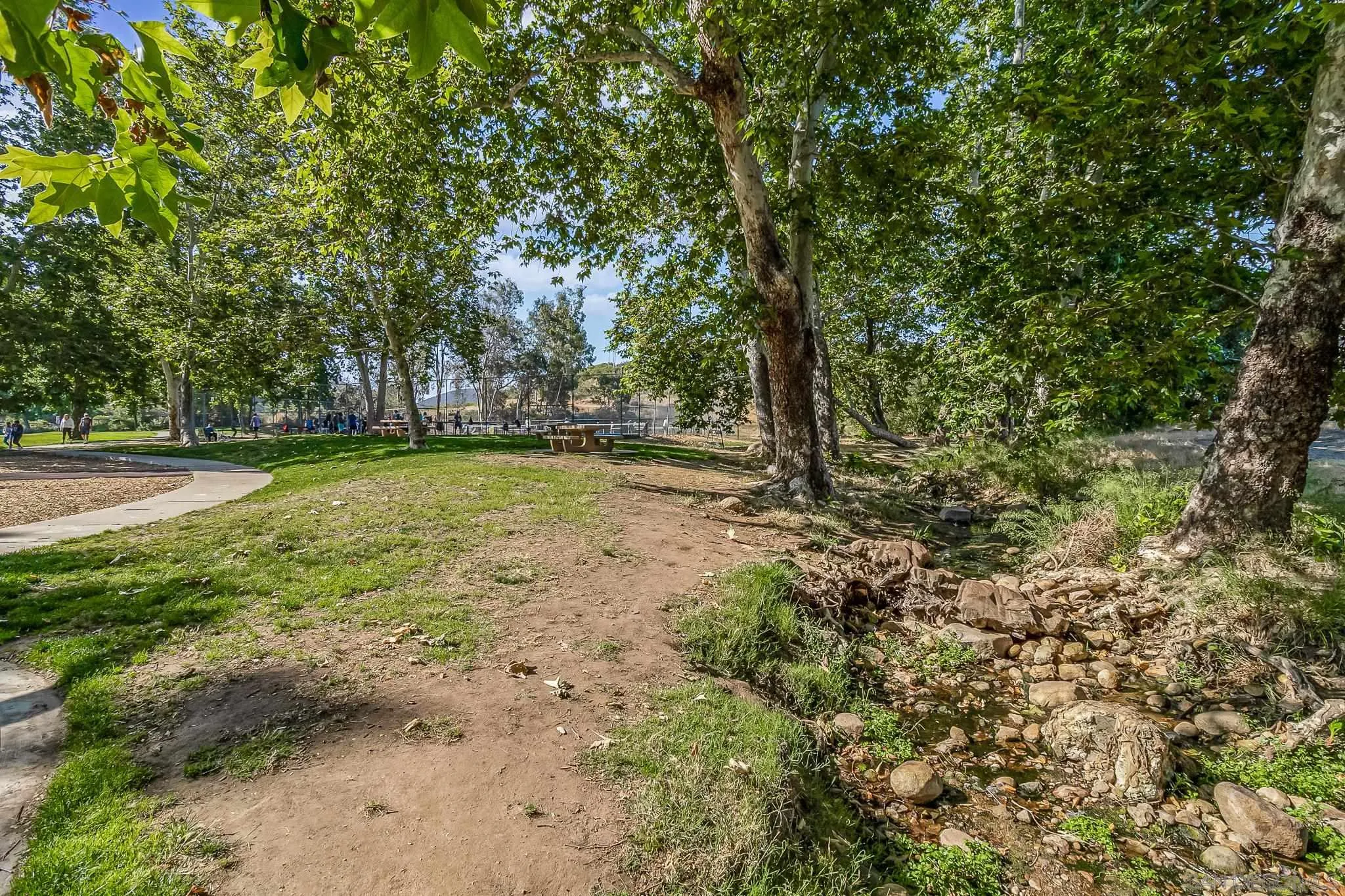 8029 Woodpecker Way Santee, CA 92071 - Photo 43 of 47 a view of a field with trees in the background