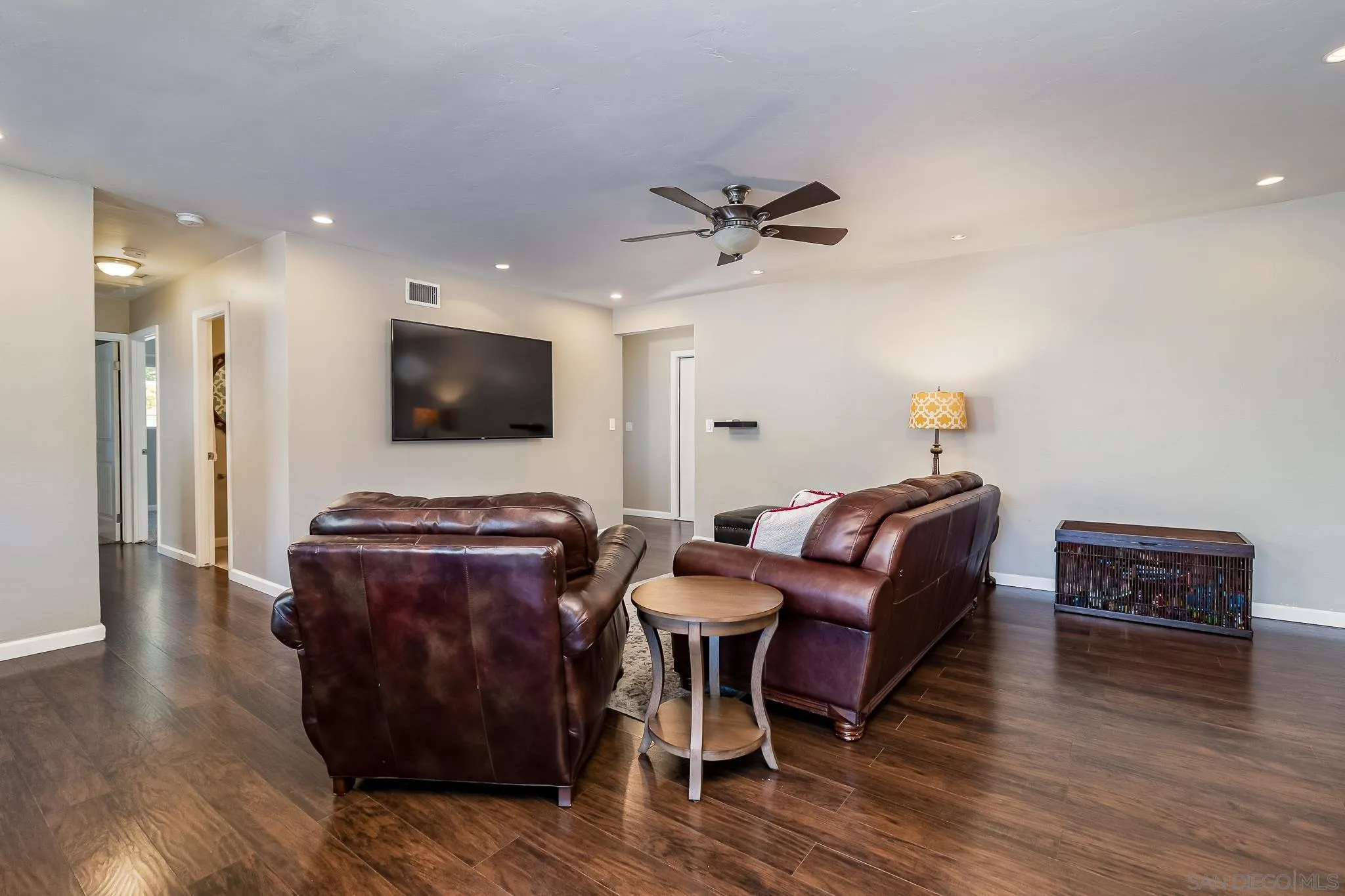 8029 Woodpecker Way Santee, CA 92071 - Photo 10 of 47 a living room with furniture and a flat screen tv