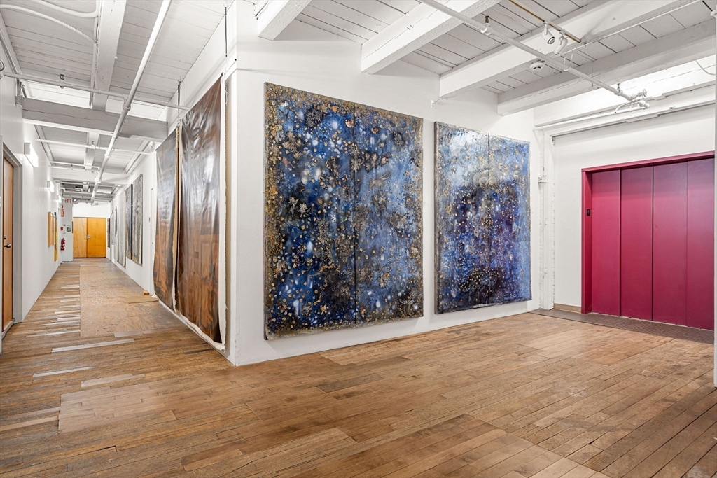 249 A Street, Unit 66 Boston, MA 02210 - Photo 23 of 26 a view of entryway with wooden floor