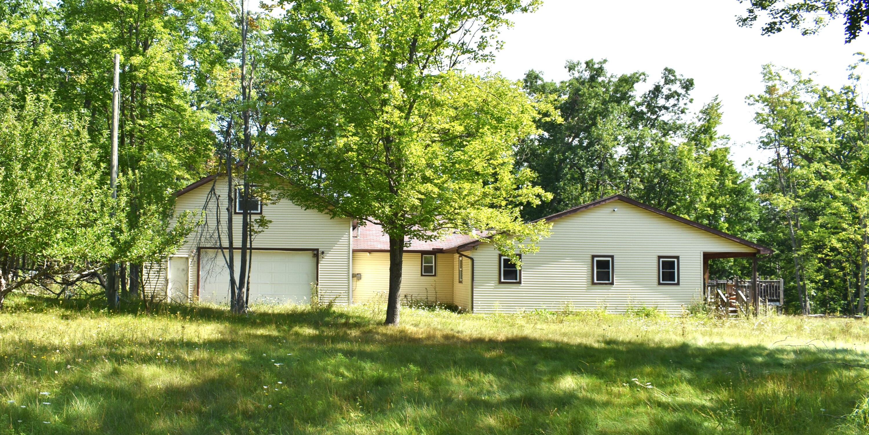 8275 Rough Road Atlanta, MI 49709 - Photo 1 of 37 Side of House