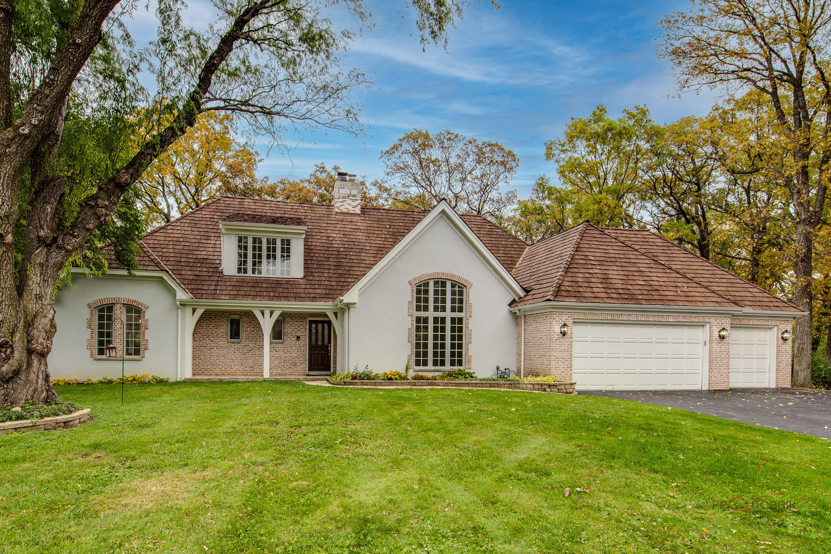 875 Valley Road Lake Forest, IL 60045 - Photo 1 of 43 a view of a house with a yard