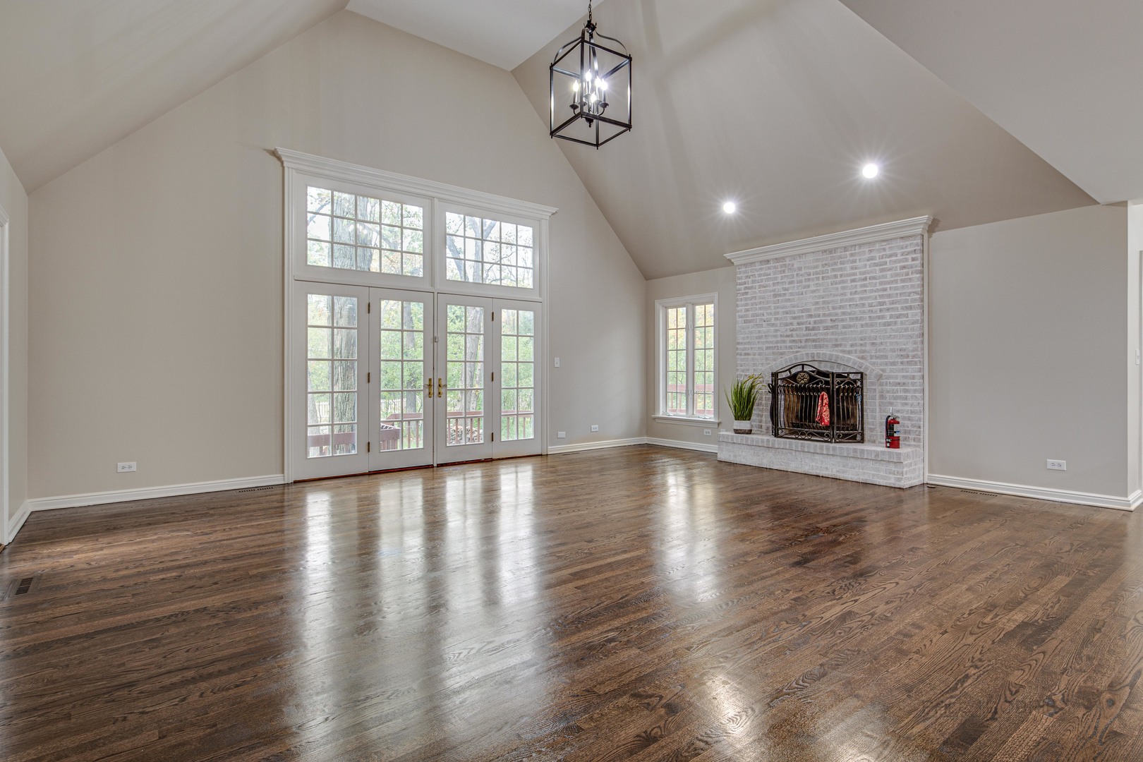 875 Valley Road Lake Forest, IL 60045 - Photo 11 of 43 a view of empty room with wooden floor and fan