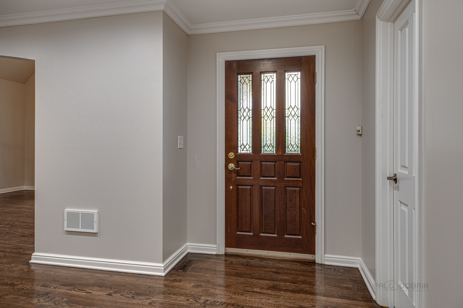 875 Valley Road Lake Forest, IL 60045 - Photo 3 of 43 a view of a hallway with wooden floor