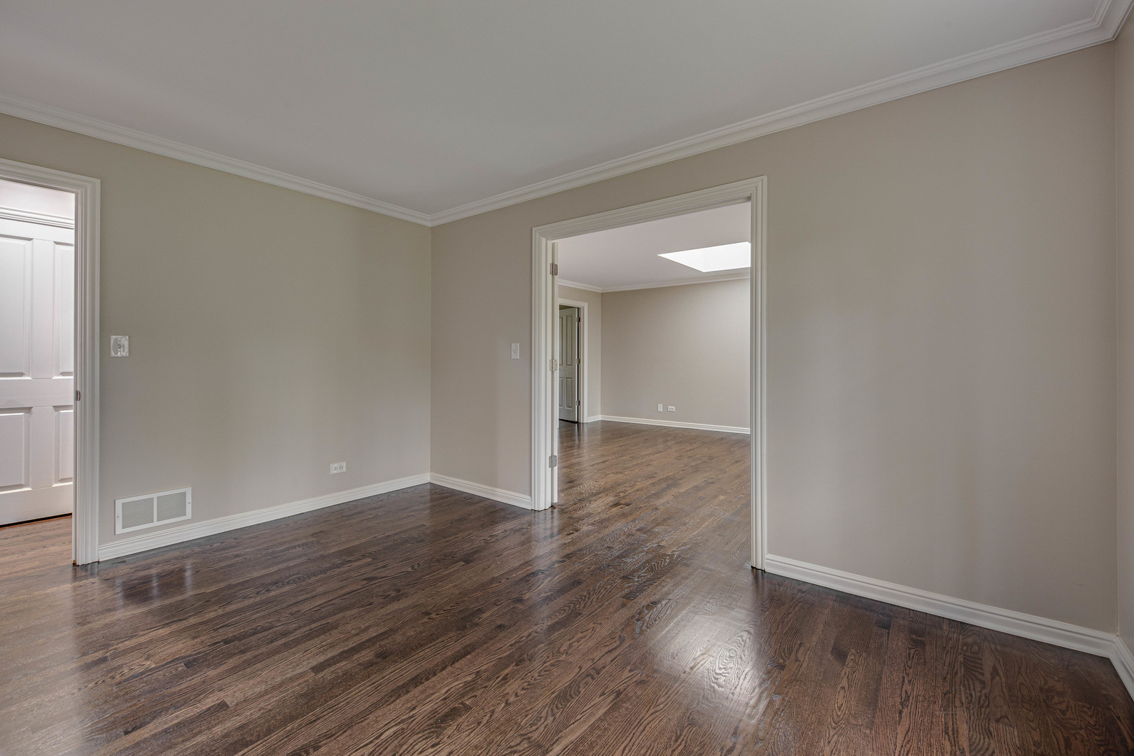 875 Valley Road Lake Forest, IL 60045 - Photo 22 of 43 a view of an empty room with wooden floor and a window