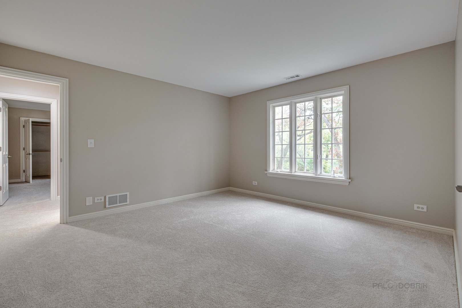 875 Valley Road Lake Forest, IL 60045 - Photo 27 of 43 an empty room with windows