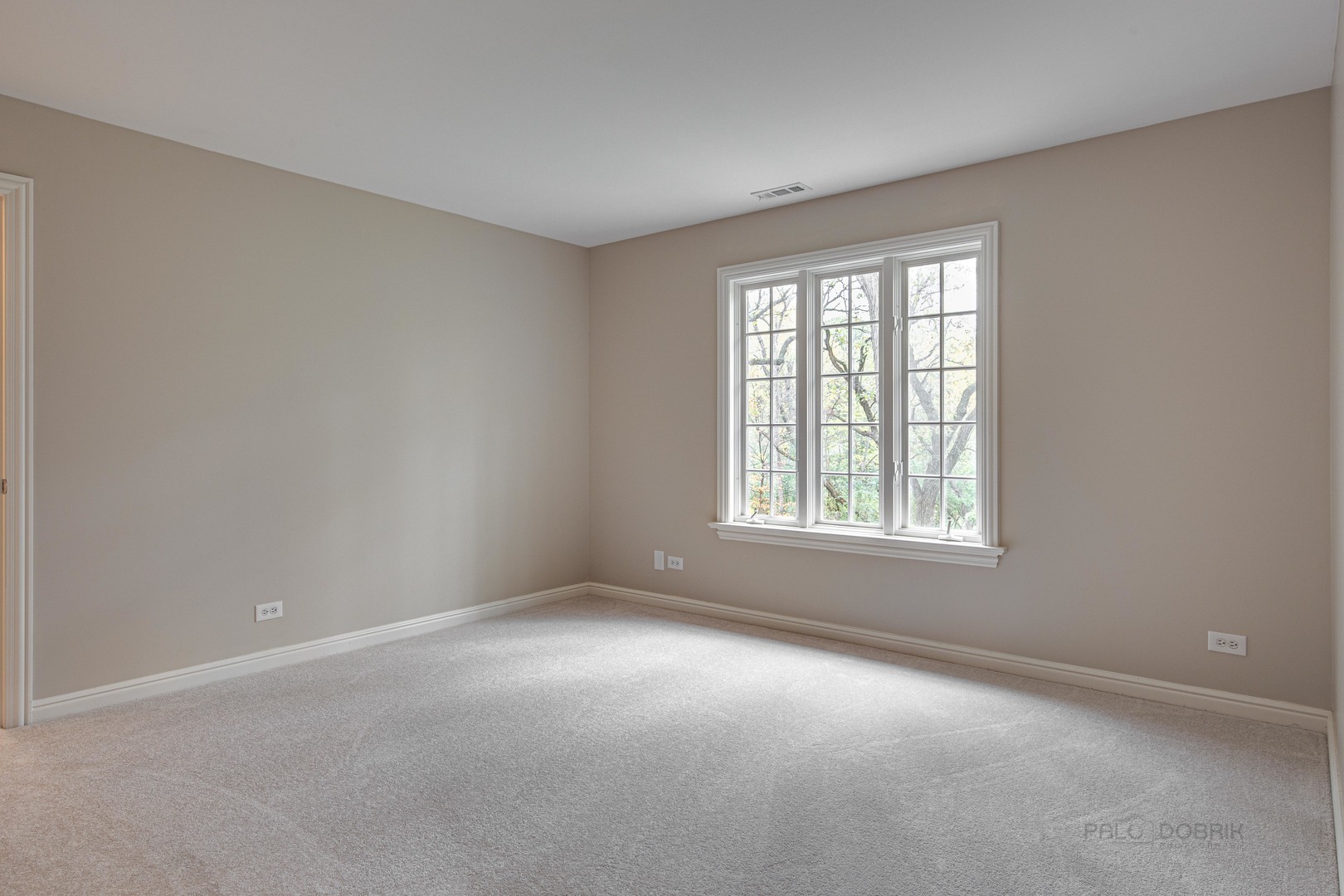 875 Valley Road Lake Forest, IL 60045 - Photo 30 of 43 an empty room with a window