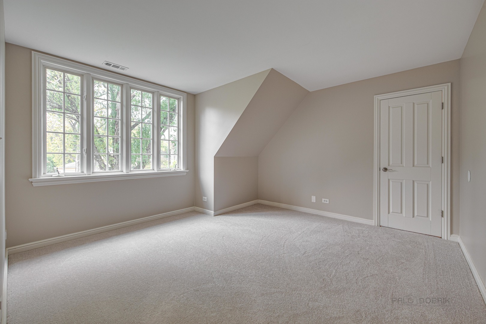 875 Valley Road Lake Forest, IL 60045 - Photo 31 of 43 an empty room with windows