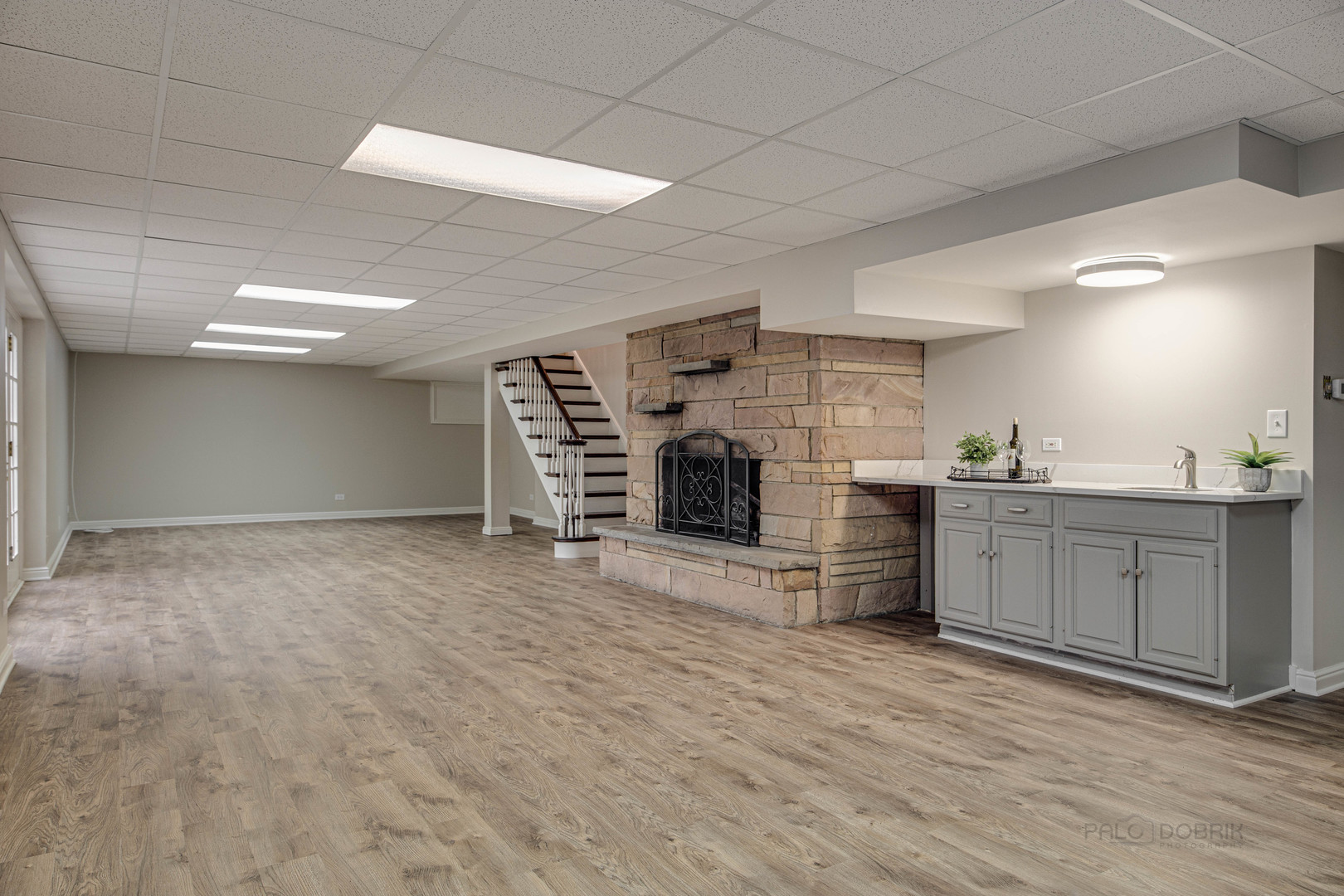 875 Valley Road Lake Forest, IL 60045 - Photo 34 of 43 a view of a kitchen with furniture and a fireplace