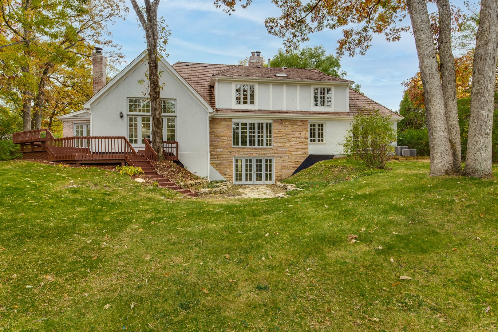 875 Valley Road Lake Forest, IL 60045 - Photo 43 of 43 a view of a house with a big yard plants and large trees