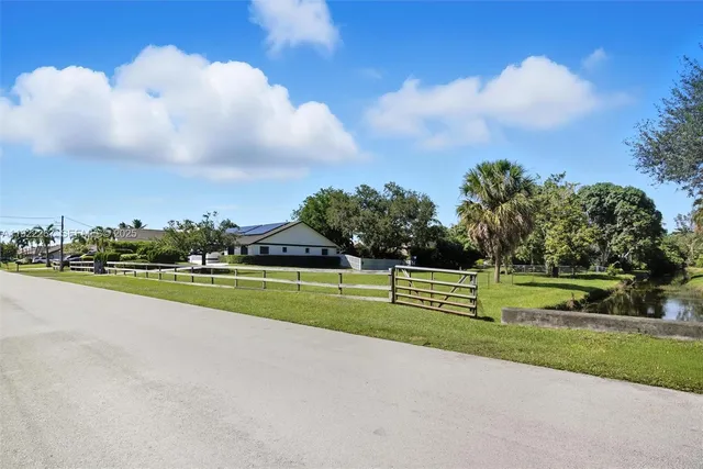 a view of a golf course with a lake