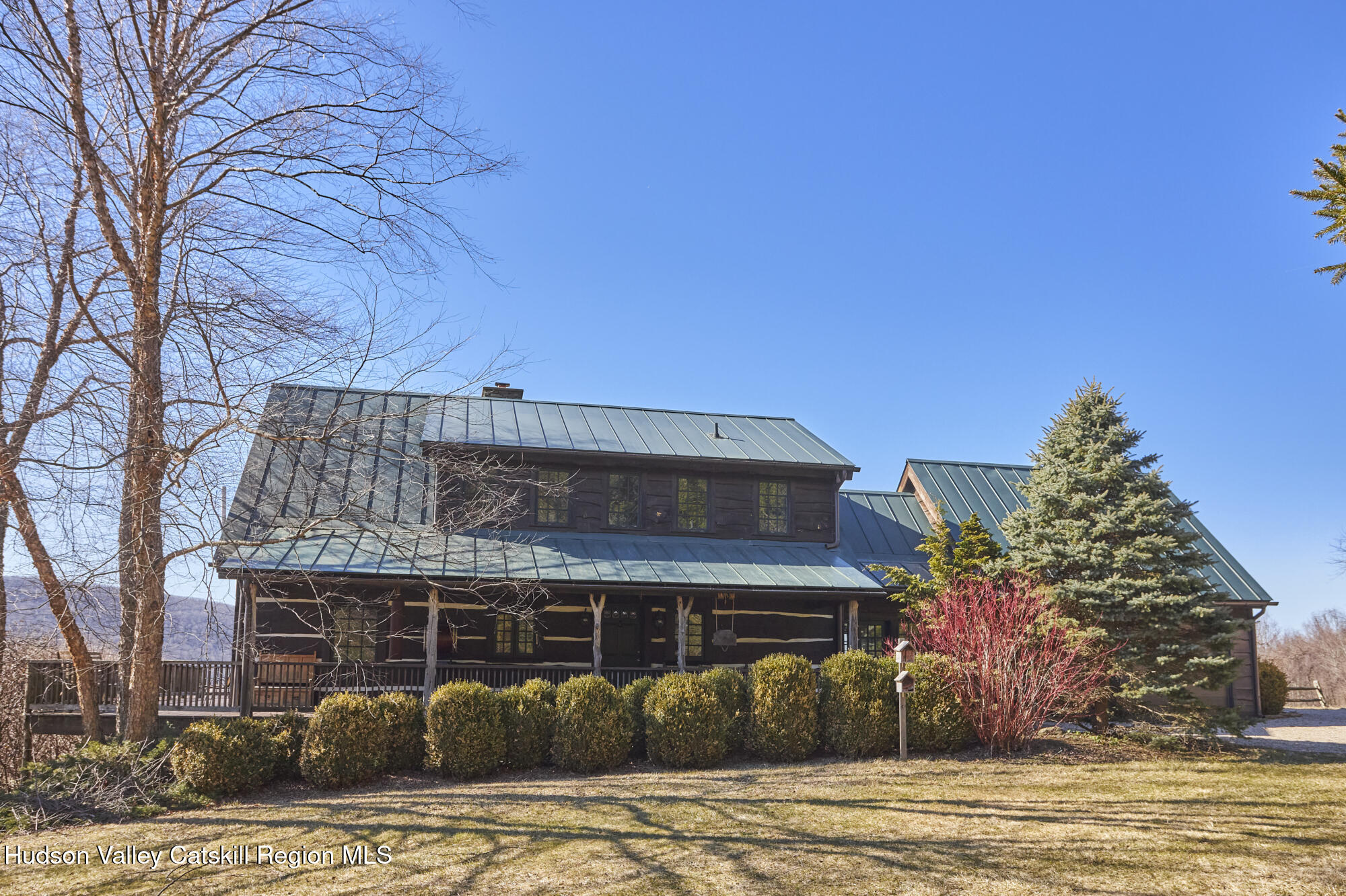 87 Kaye Road Millerton, NY 12546 - Photo 2 of 46 a front view of a house with a yard