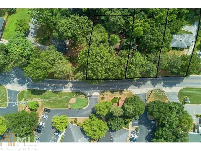 a aerial view of a house with a yard