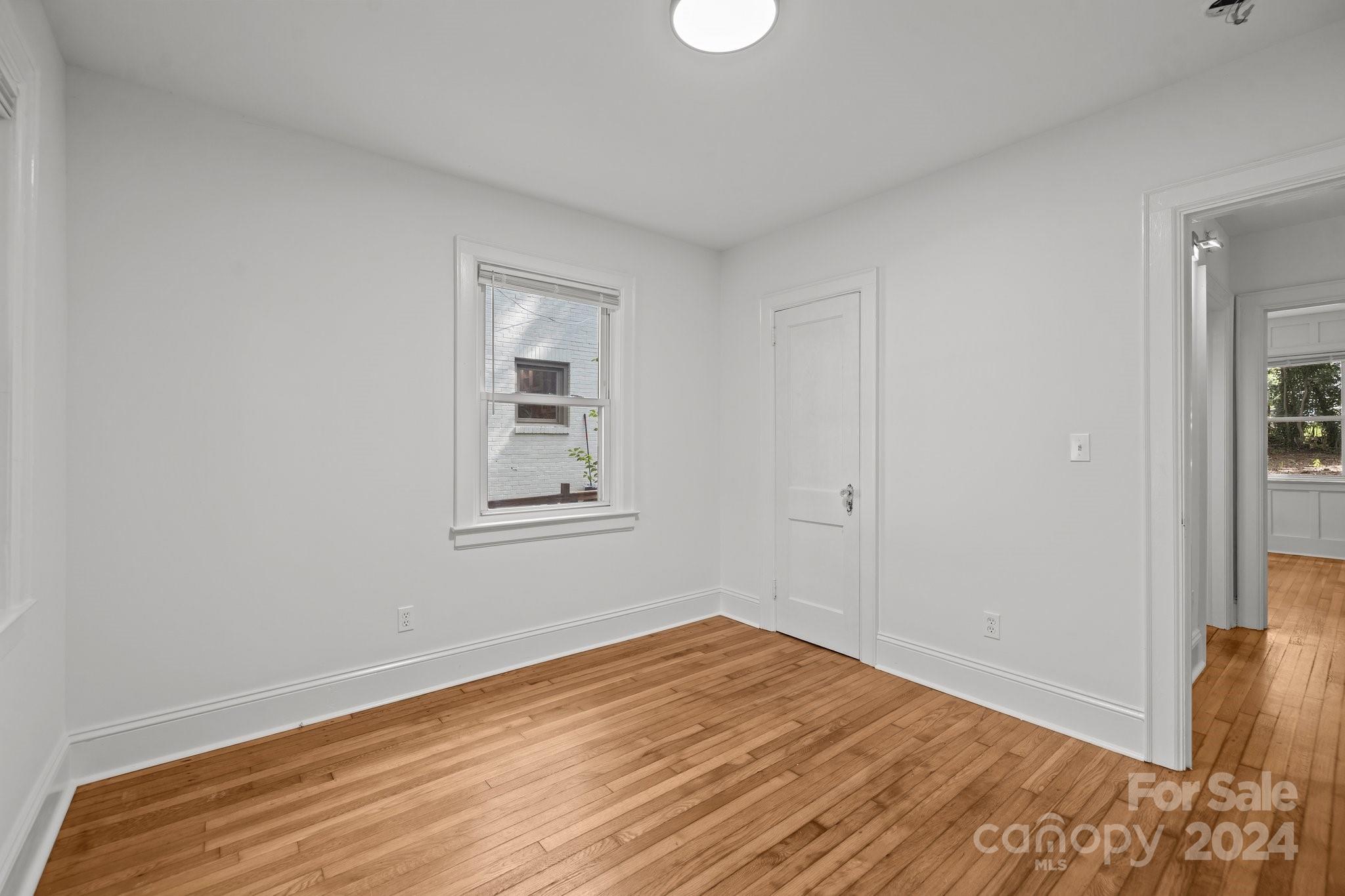 3020 Rush Avenue Charlotte, NC 28208 - Photo 12 of 31 a view of empty room with wooden floor