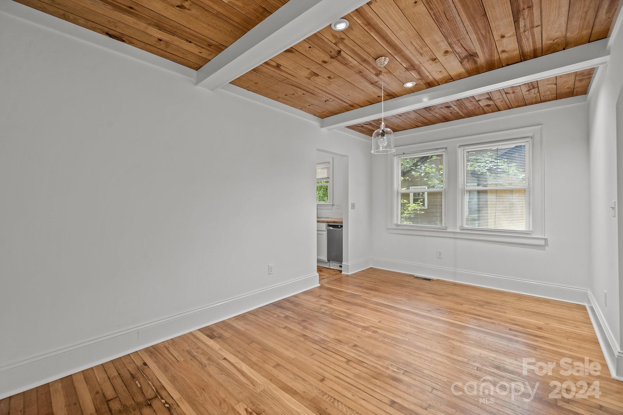 3020 Rush Avenue Charlotte, NC 28208 - Photo 13 of 31 a view of empty room with wooden floor and fan