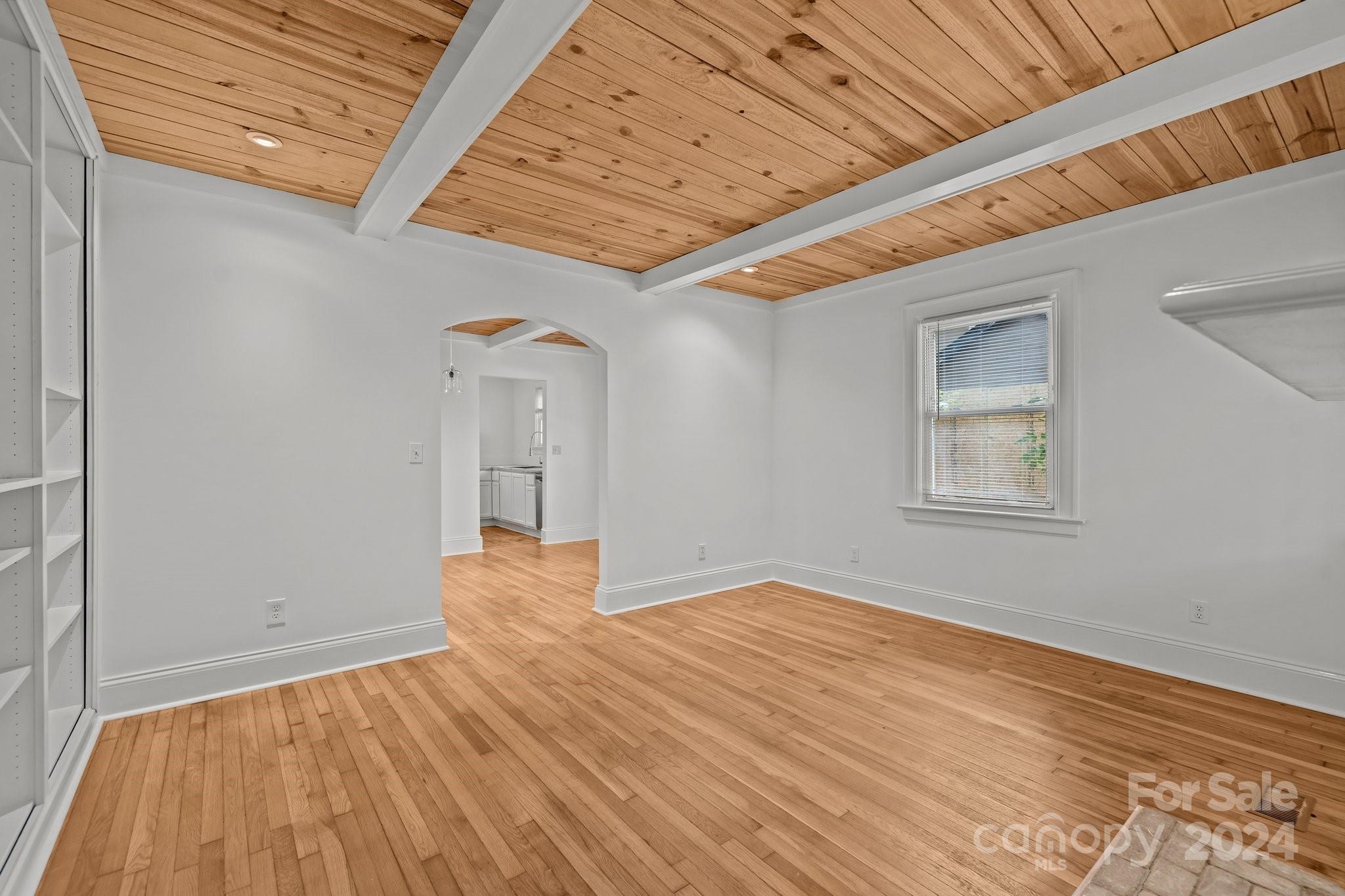 3020 Rush Avenue Charlotte, NC 28208 - Photo 17 of 31 a view of empty room with wooden floor and fan
