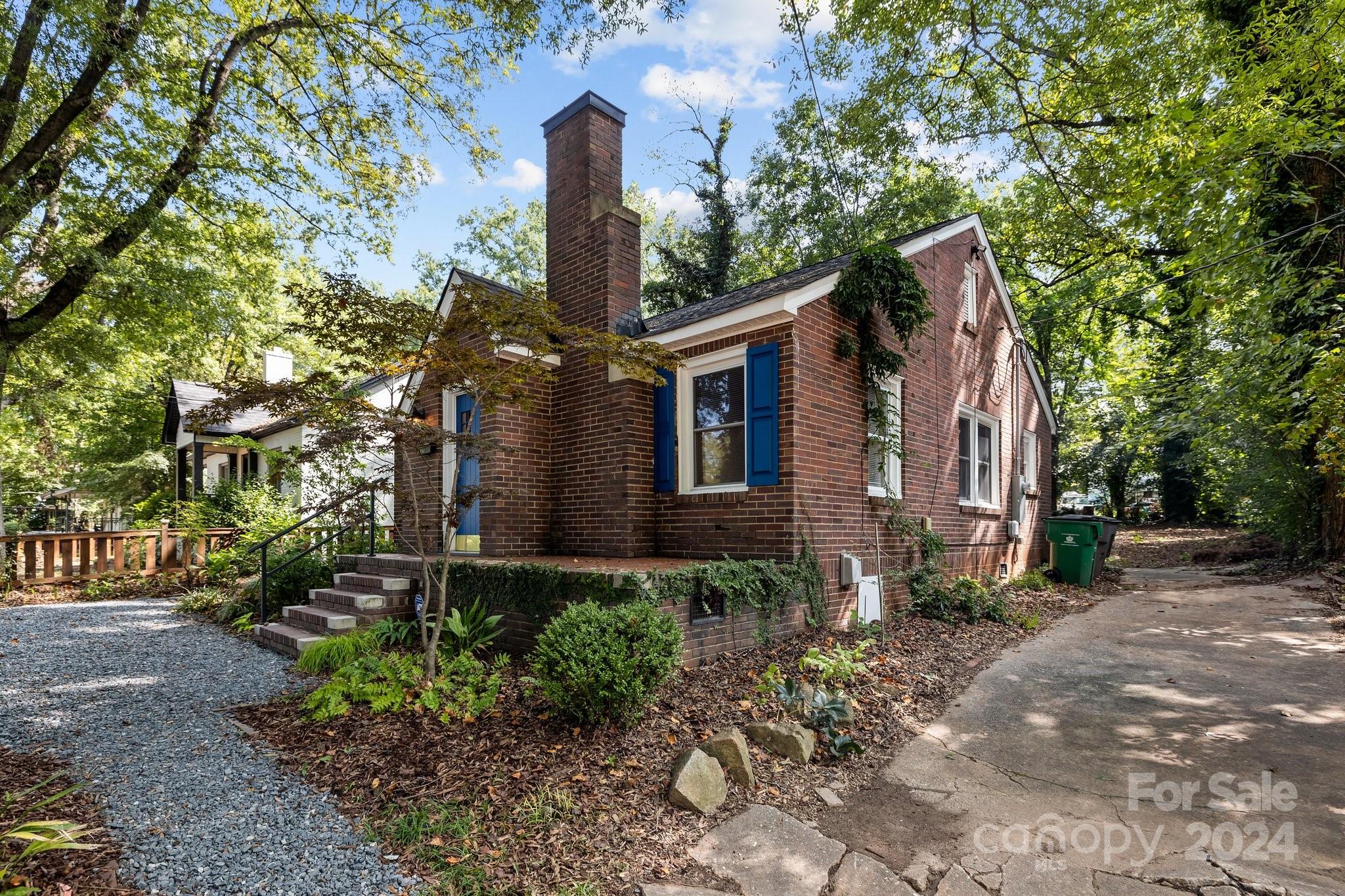 3020 Rush Avenue Charlotte, NC 28208 - Photo 2 of 31 a front view of a house with garden