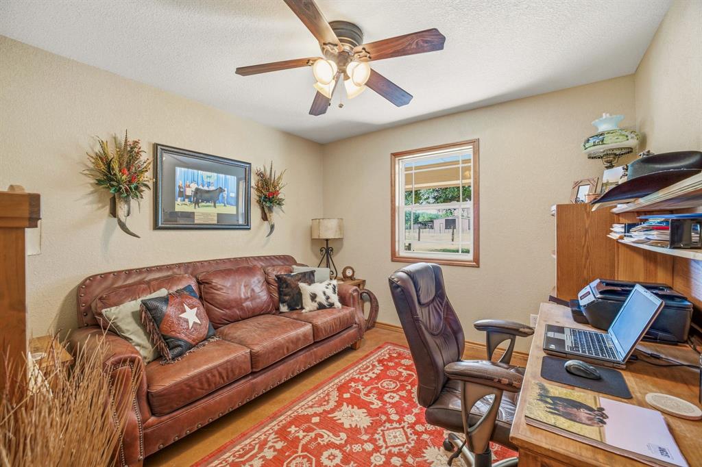 2548 Fm 1496 Dublin, TX 76446 - Photo 20 of 40 a living room with furniture a flat screen tv and a window