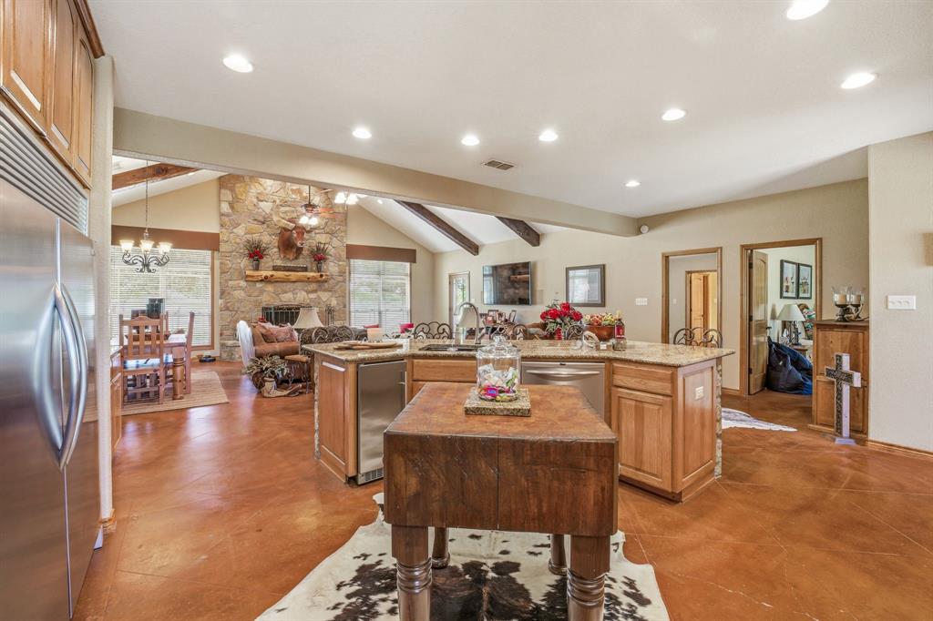 2548 Fm 1496 Dublin, TX 76446 - Photo 10 of 40 a kitchen with lots of counter top space and stainless steel appliances