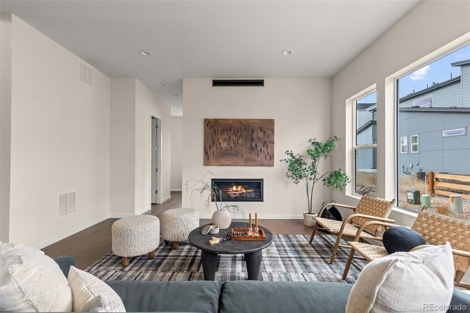 11332 Alla Breve Lone Tree, CO 80134 - Photo 21 of 50 a living room with furniture and a potted plant