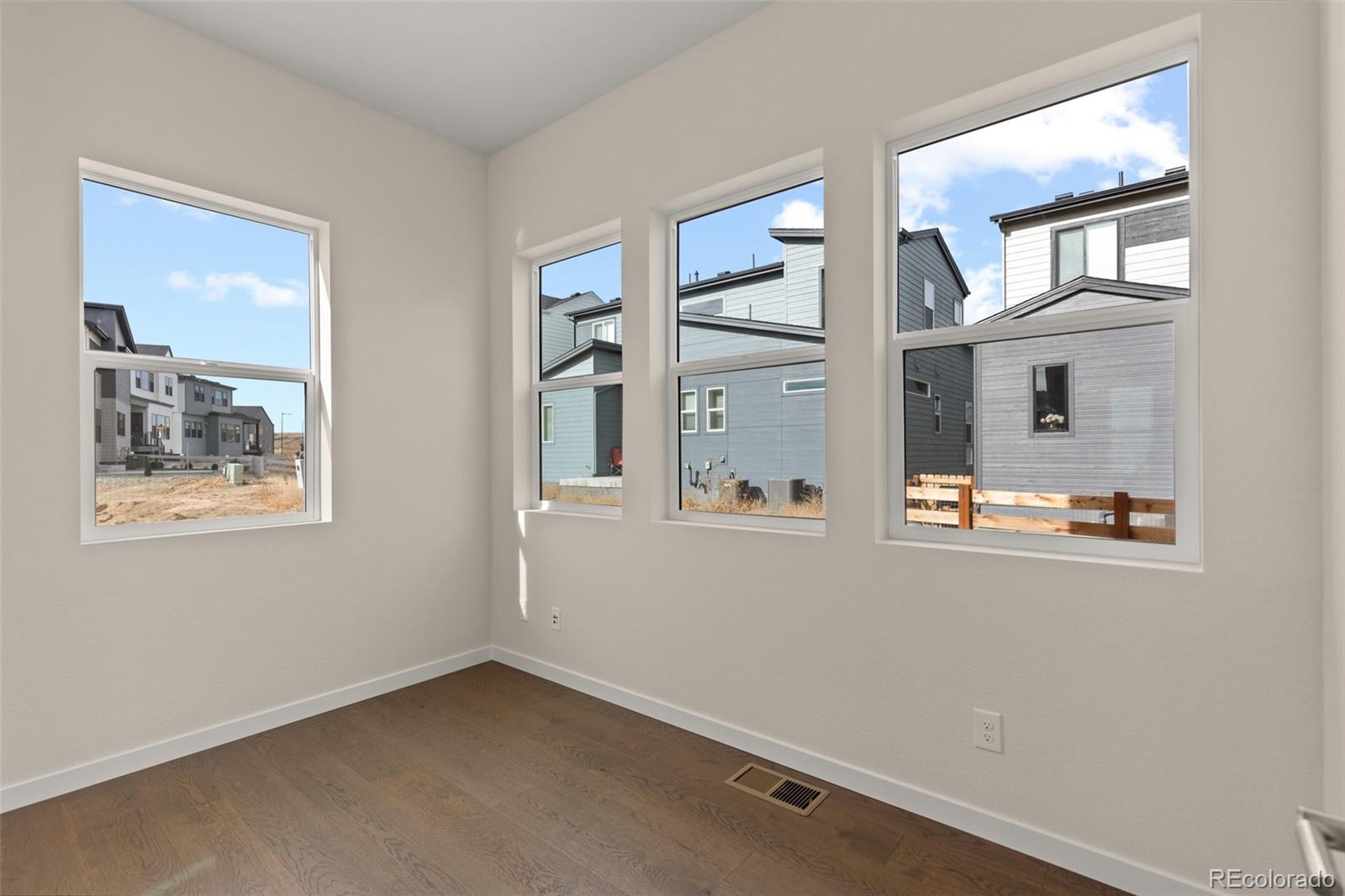 11332 Alla Breve Lone Tree, CO 80134 - Photo 25 of 50 an empty room with windows