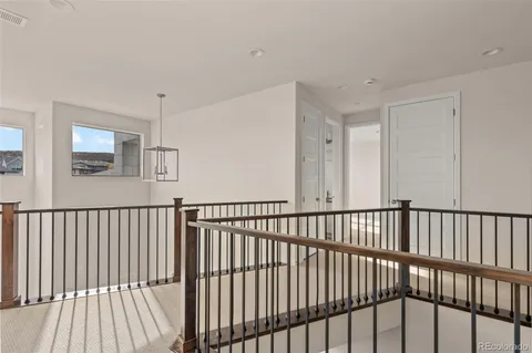 a view of a porch with wooden floor