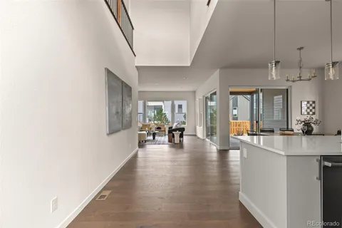 a lobby with furniture and wooden floor