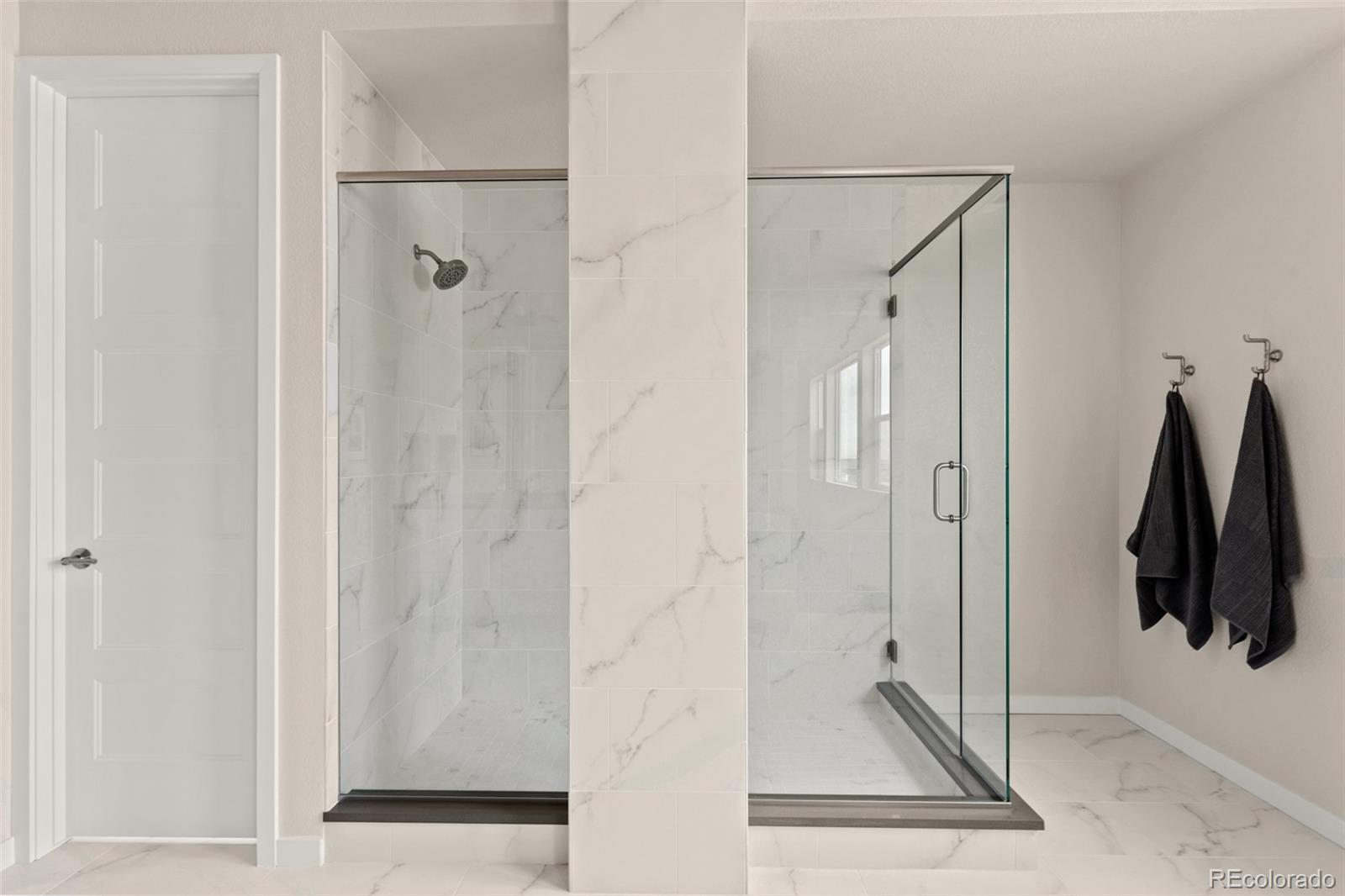 11332 Alla Breve Lone Tree, CO 80134 - Photo 41 of 50 a bathroom with a shower