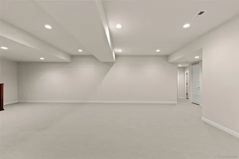 an empty room with an entryway