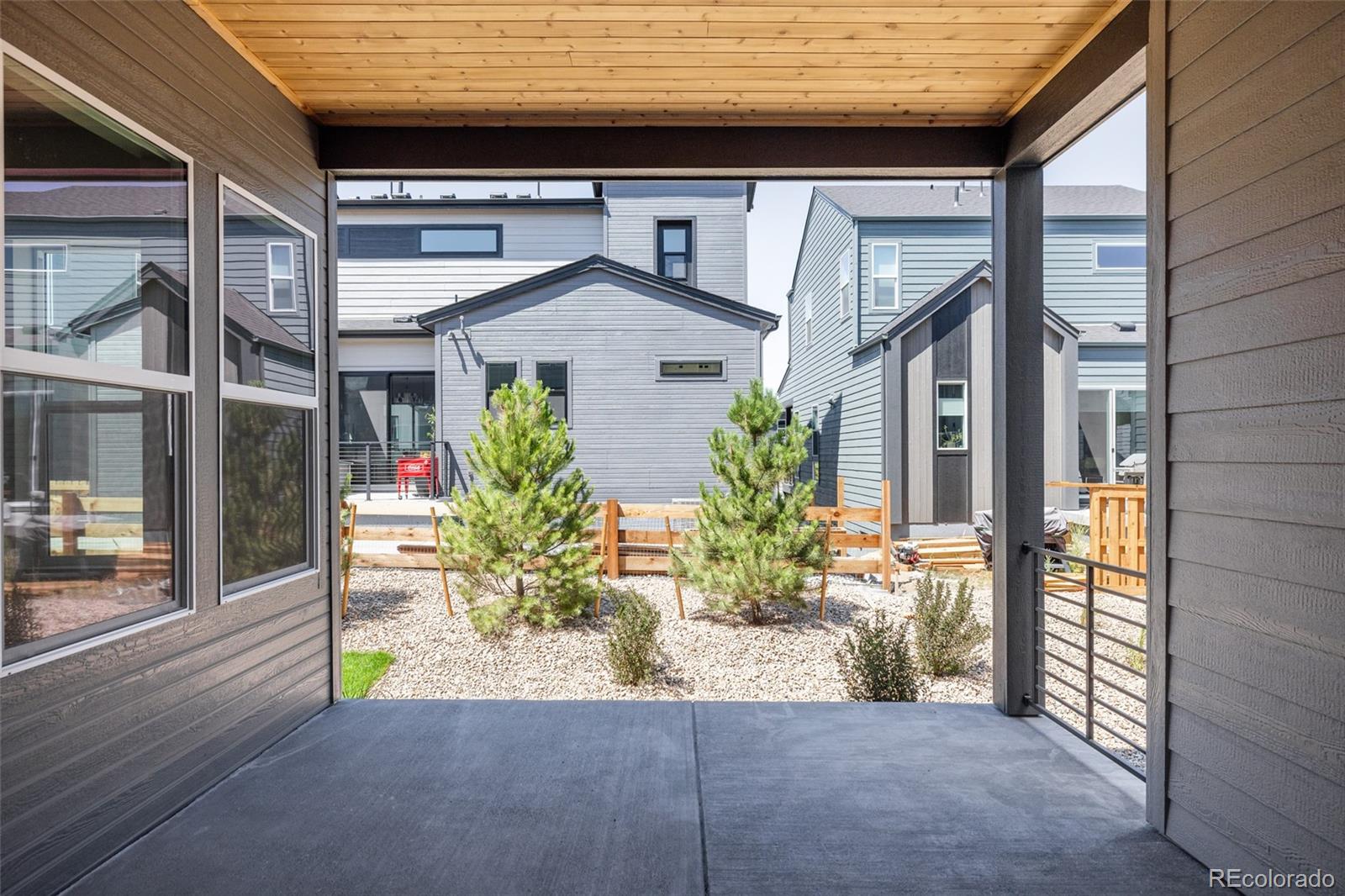 11332 Alla Breve Lone Tree, CO 80134 - Photo 49 of 50 a view of a brick house with potted plants