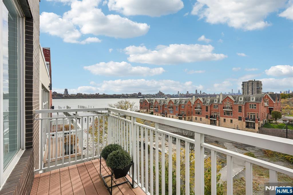 25 Vela Way Edgewater, NJ 07020 - Photo 20 of 41 a view of a balcony with city view