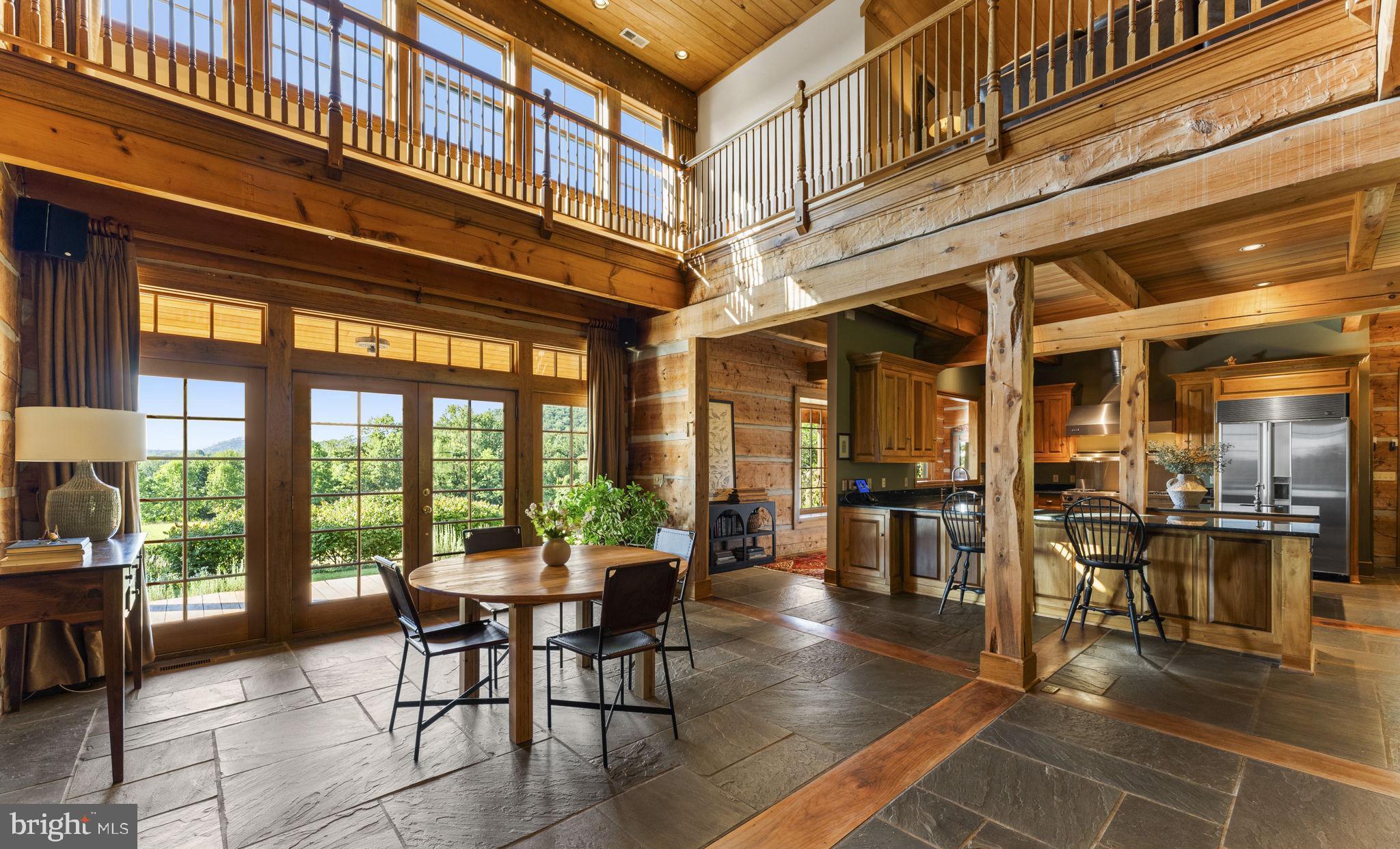 156 Bear Wallow Road Huntly, VA 22640 - Photo 20 of 68 a dining room with furniture and wooden floor