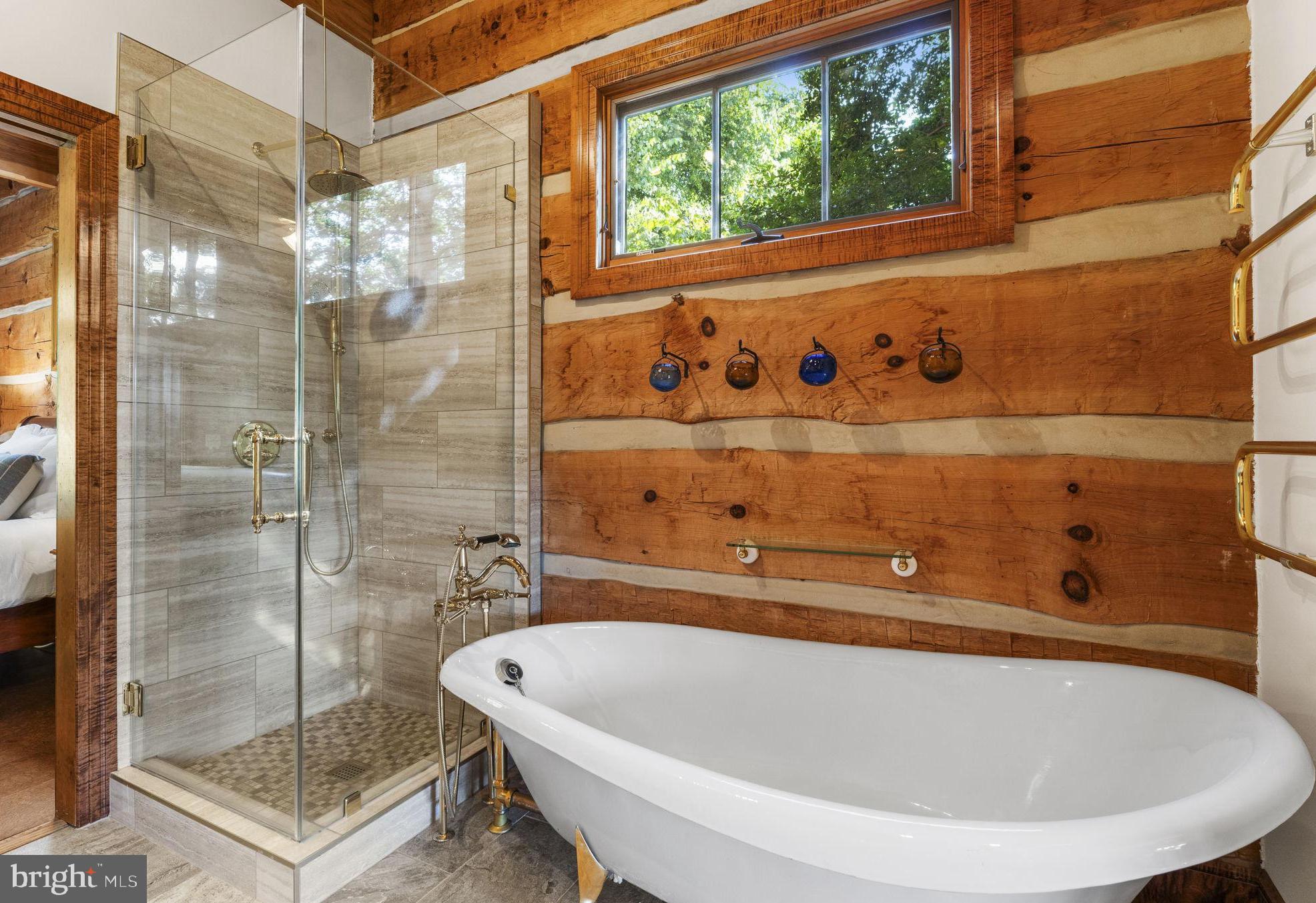 156 Bear Wallow Road Huntly, VA 22640 - Photo 35 of 68 a bathroom with a tub and a shower