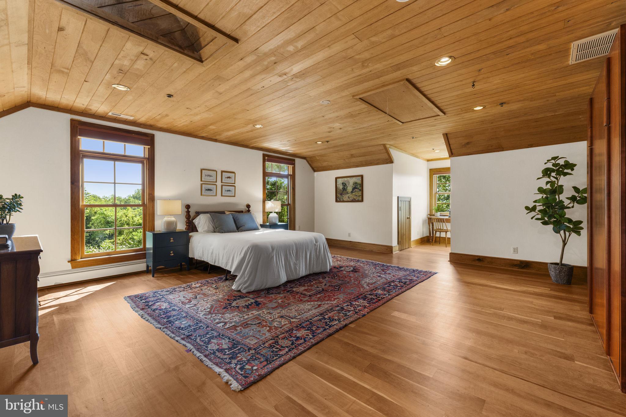 156 Bear Wallow Road Huntly, VA 22640 - Photo 42 of 68 a spacious bedroom with a large bed and a window