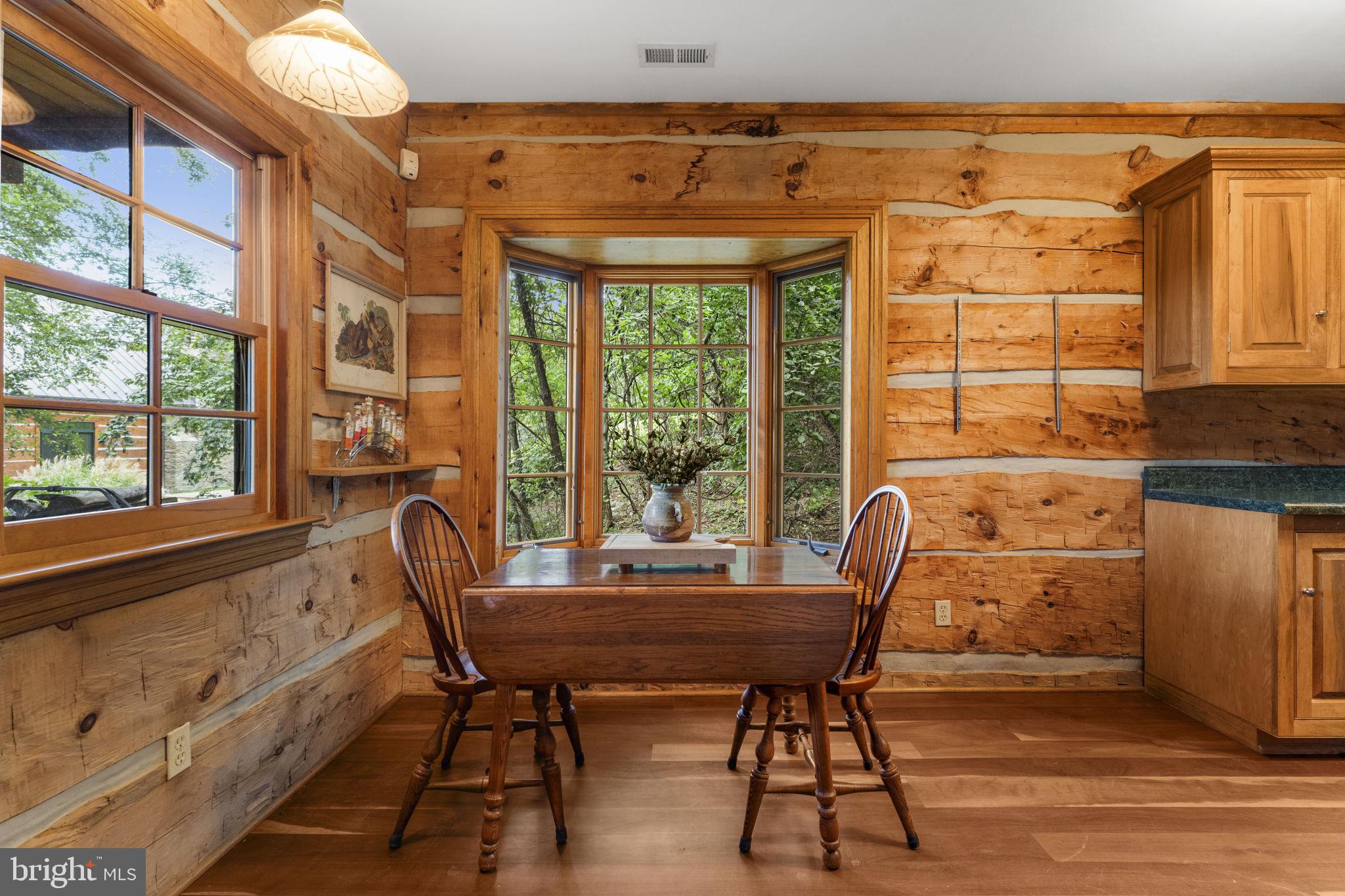 156 Bear Wallow Road Huntly, VA 22640 - Photo 49 of 68 a view of a dining room with furniture window and outside view