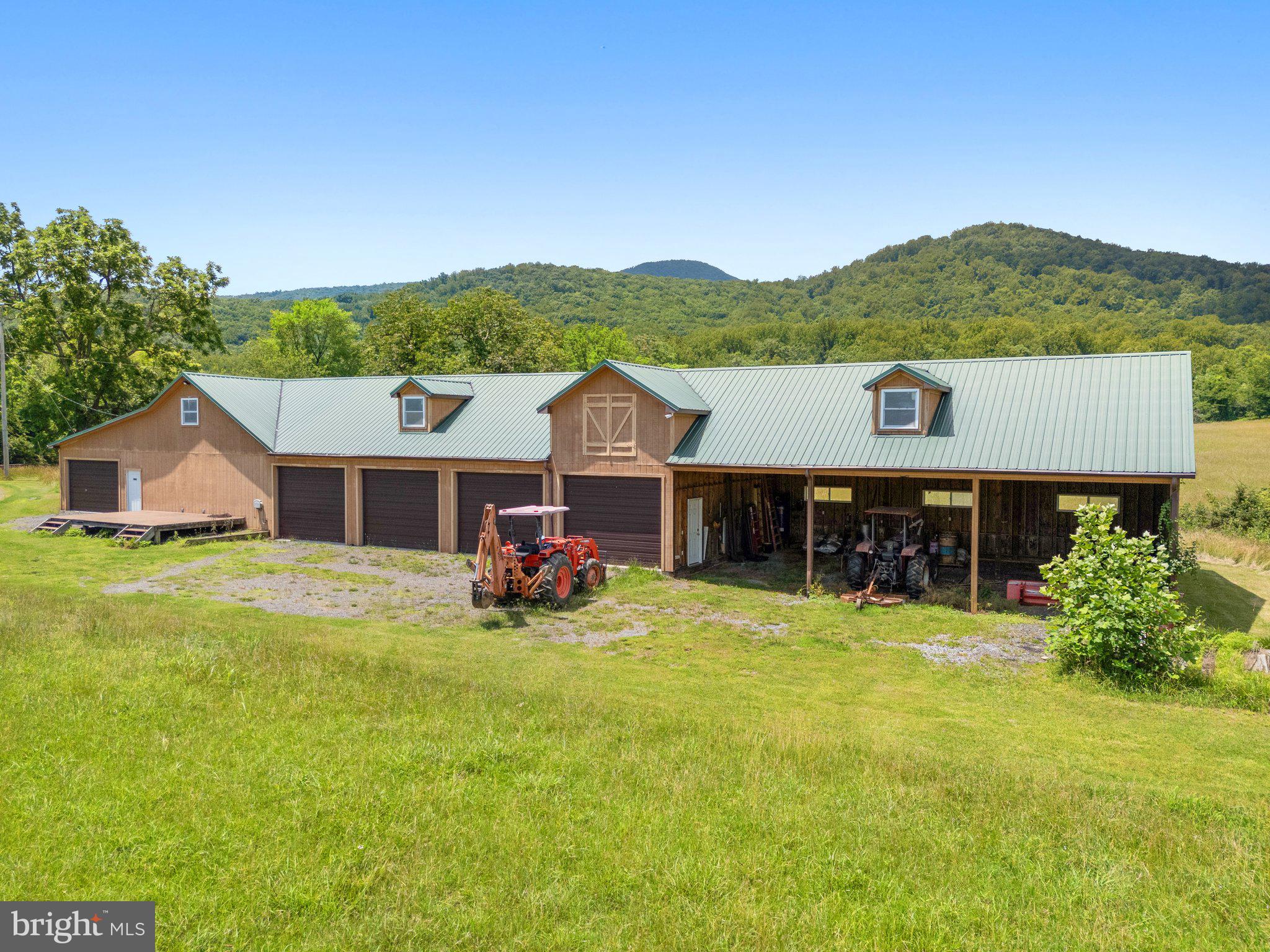 156 Bear Wallow Road Huntly, VA 22640 - Photo 63 of 68 a view of a house with garden and a car park front of house